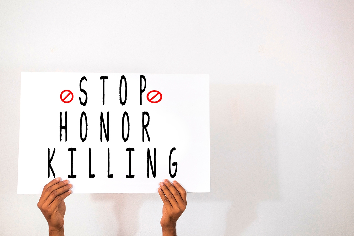 Schild mit der Aufschrift: Stop Honor Killing