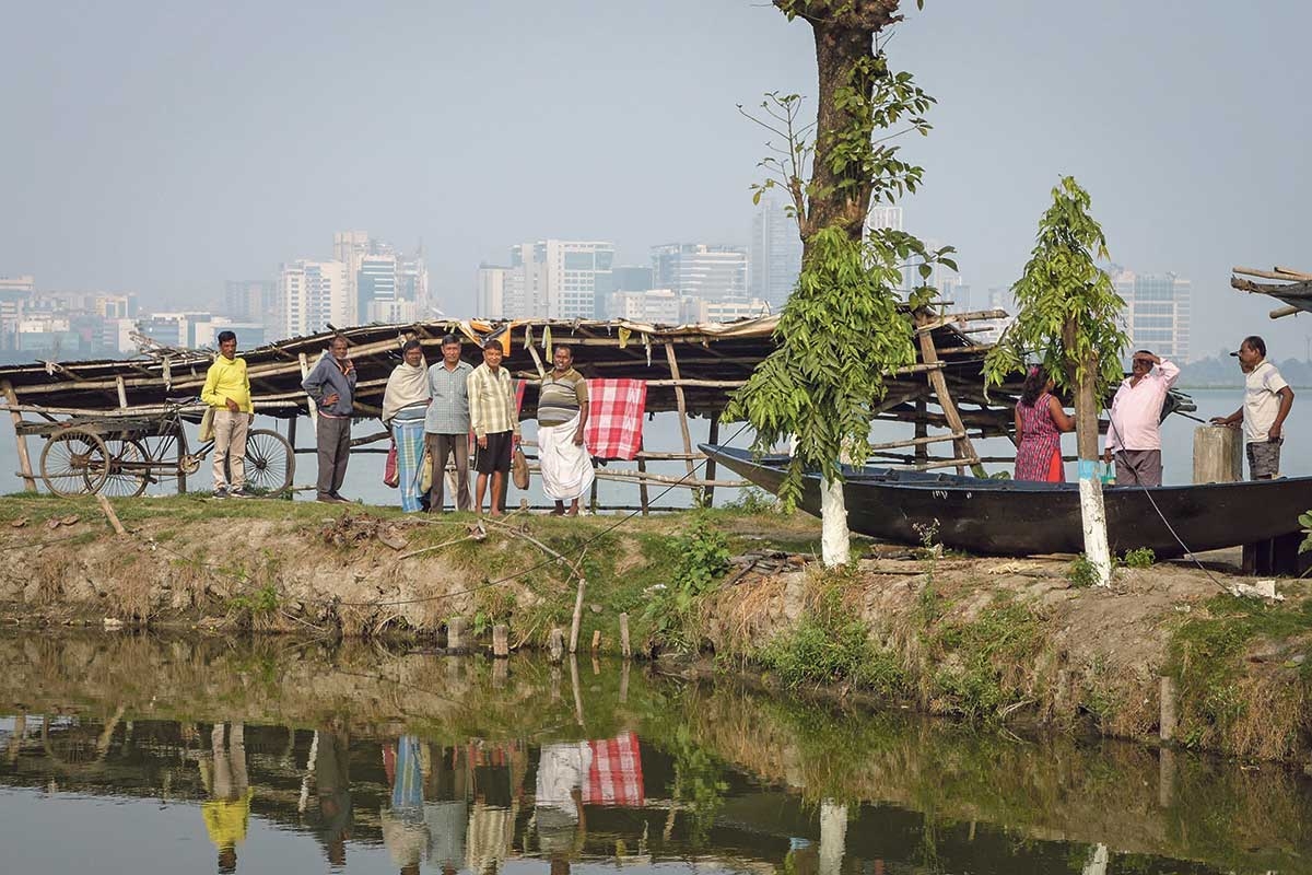 Werden immer häufiger von der Immobilienbranche verdrängt: Fischer in den Feuchtgebieten Kolkatas 