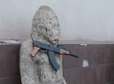 Replica of a Russian submachine gun on display in the destroyed Mariupol local history museum